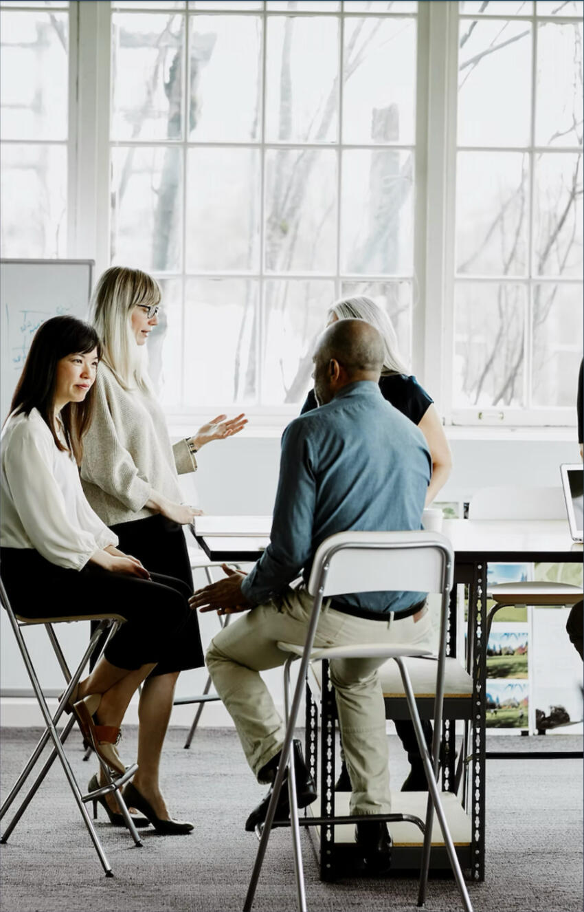 About Us Team working in an office